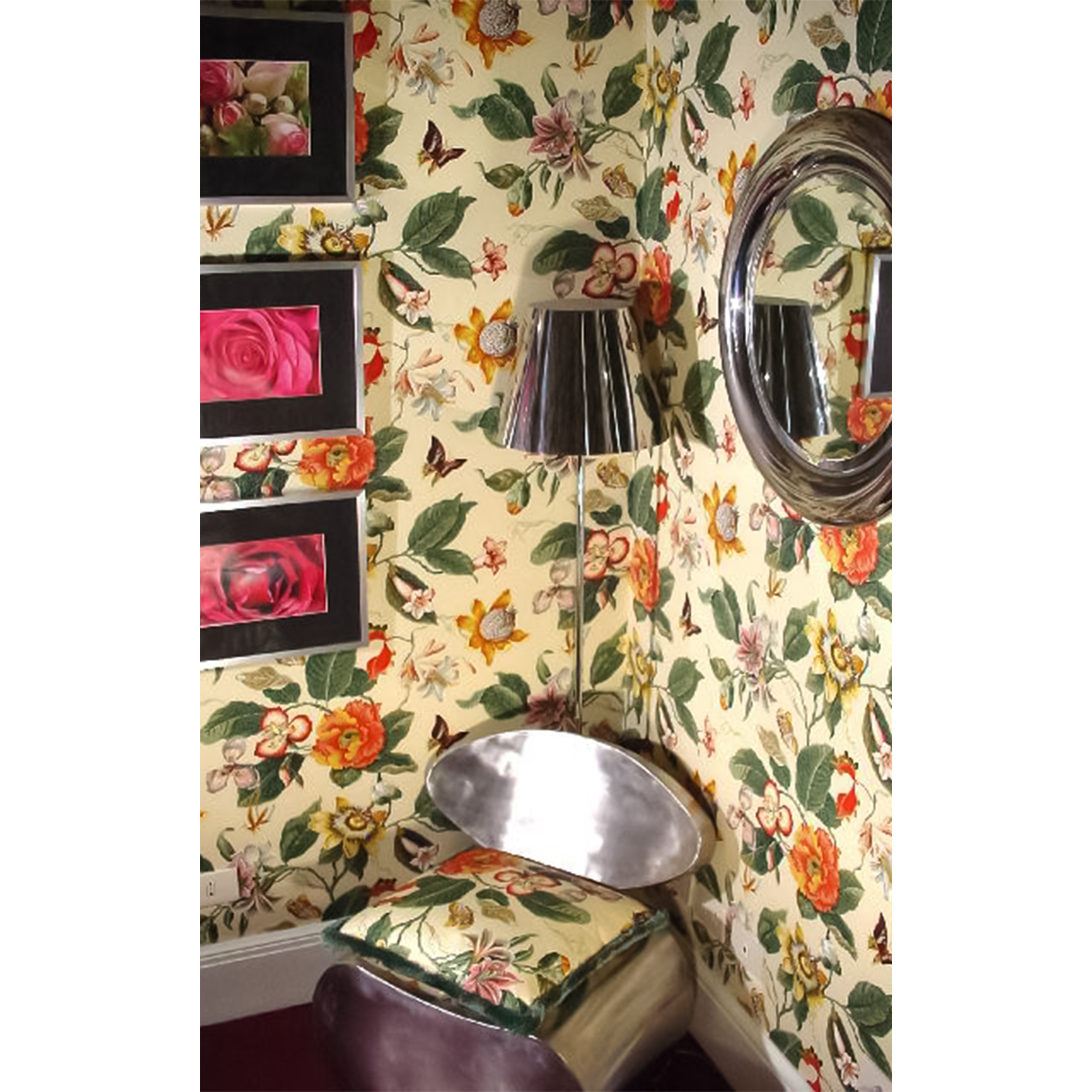 floral wallpaper with metal lamp and chair