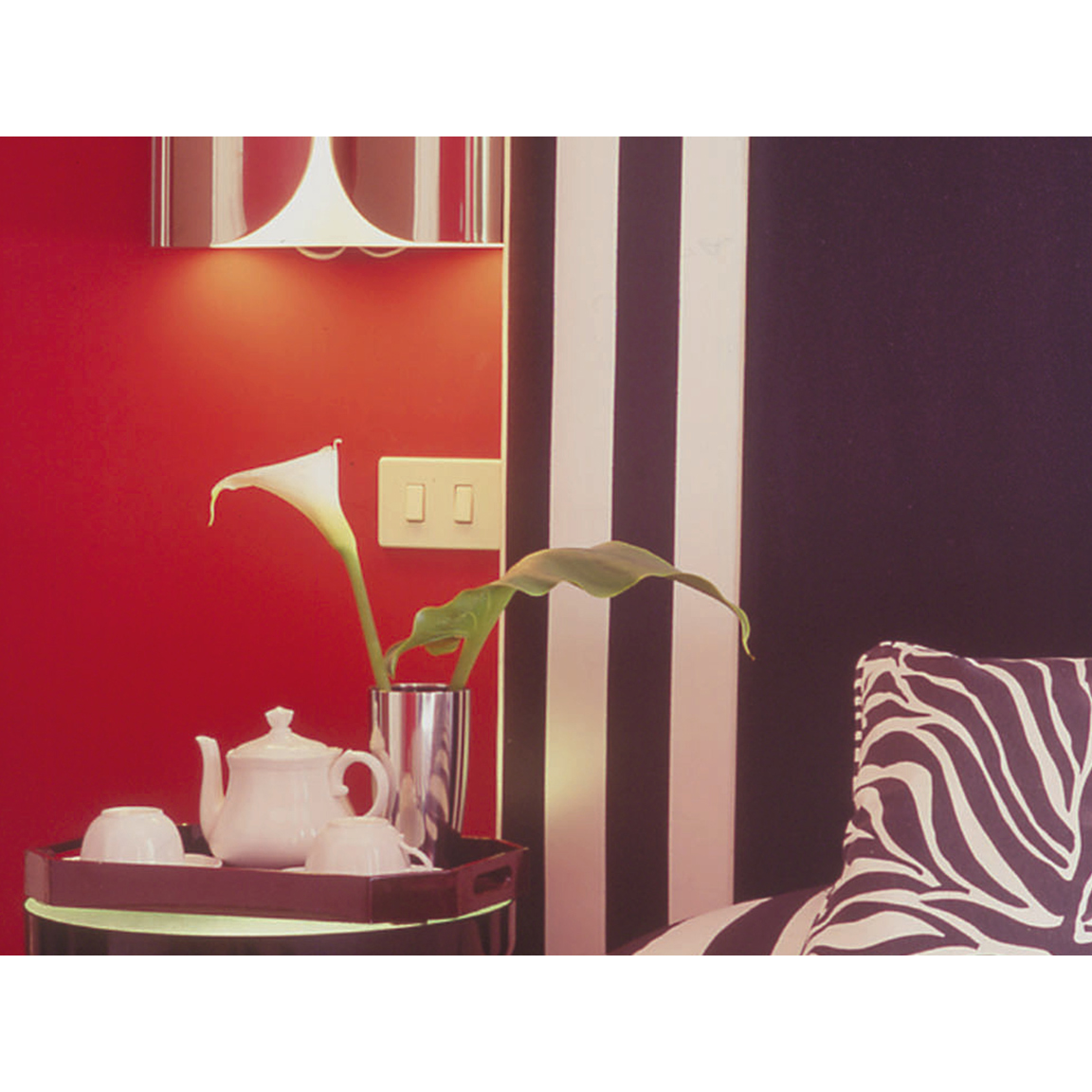 red scheme bedroom with zebra fabric