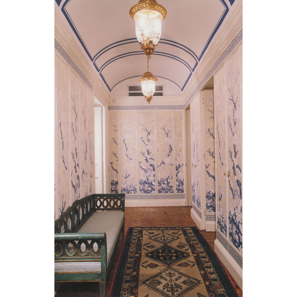 hallway with wooden sofa and chinese wallpaper