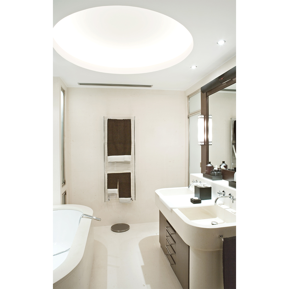 white stone bathroom with circular ceiling