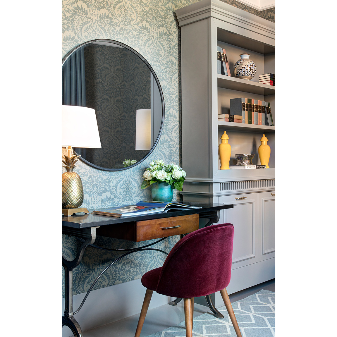 spagna penthouse desk with chair and mirror next to library